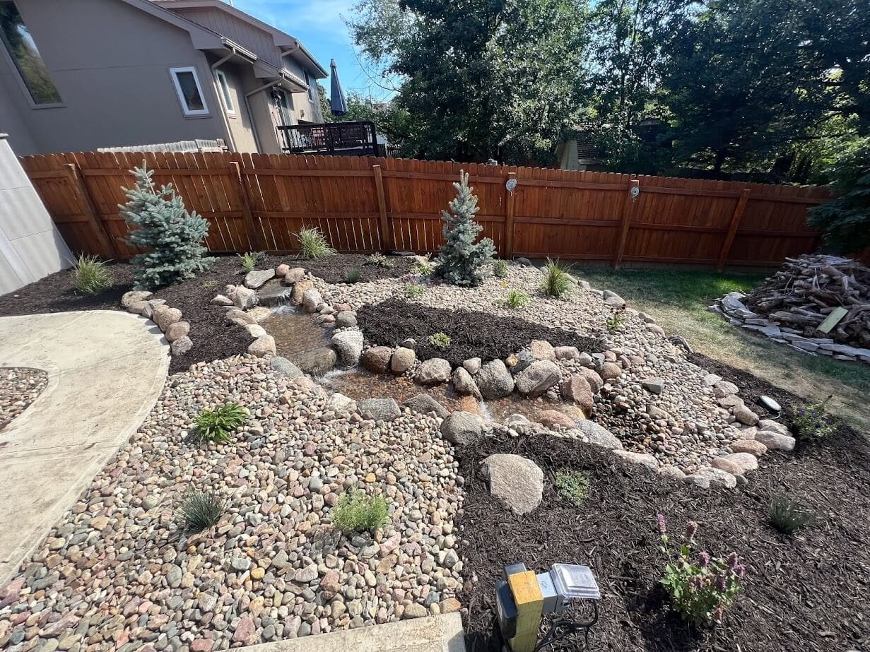 Custom water feature installation by Kanger Lawns